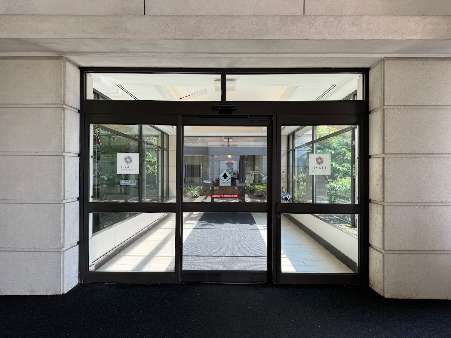 a glass doors with glass windows