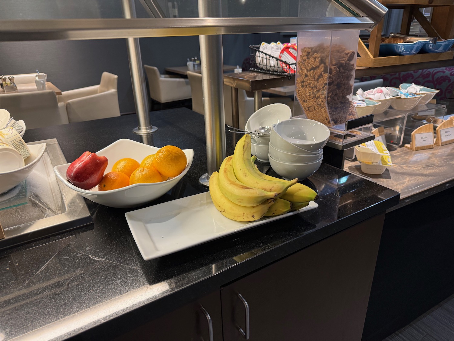 a group of fruits on a counter