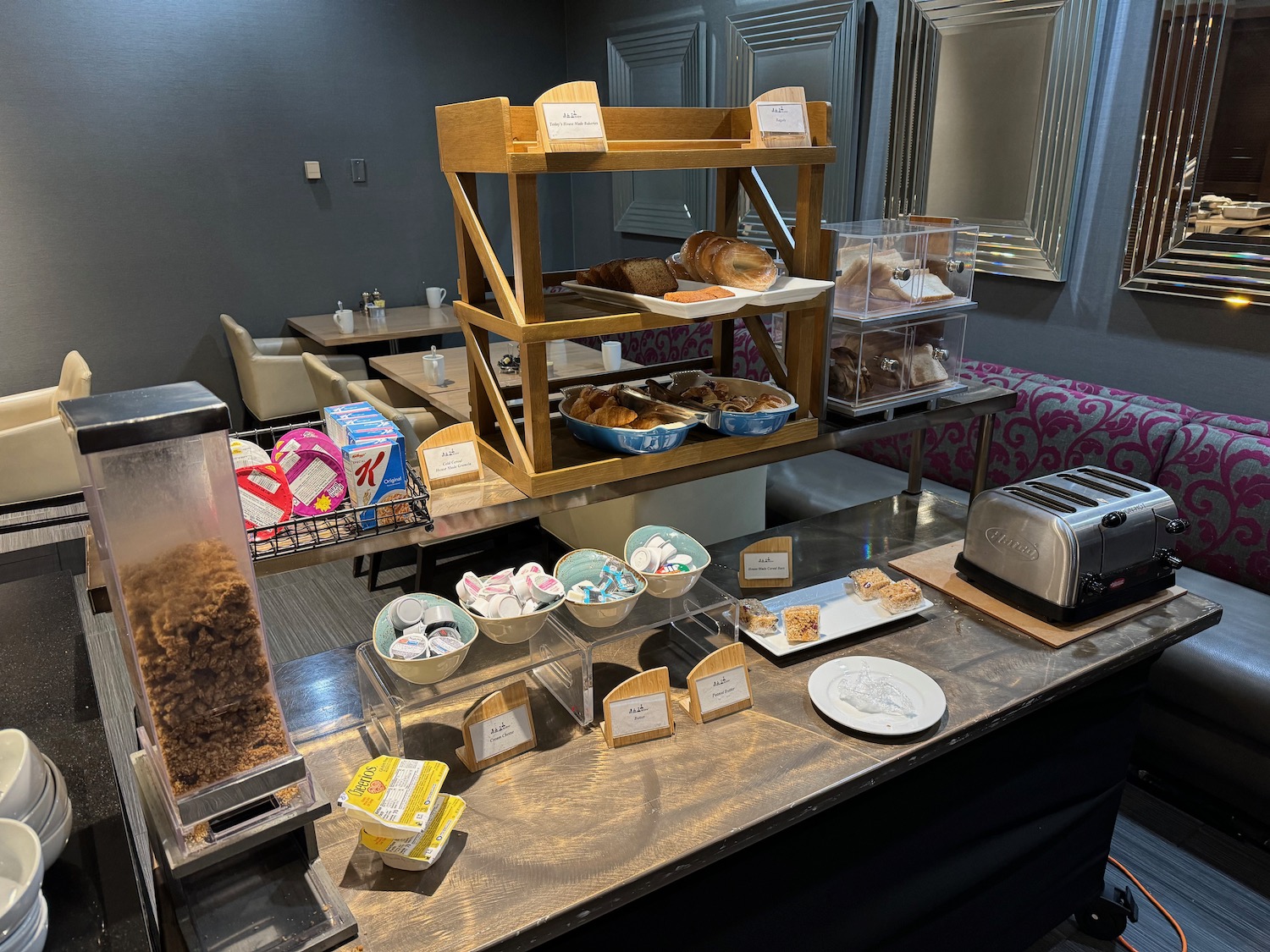 a display of bread and pastries on a counter