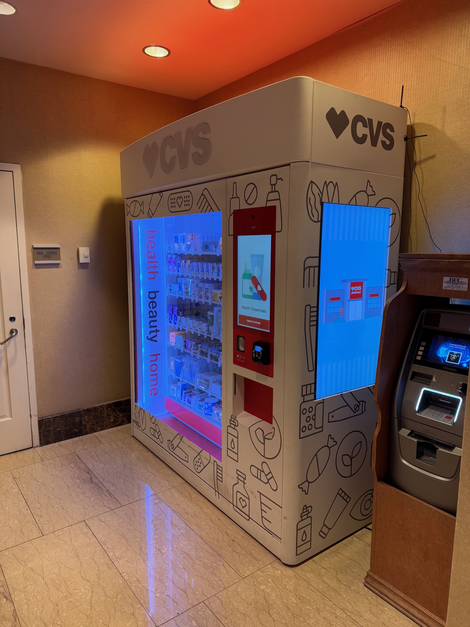 a vending machine with a blue light