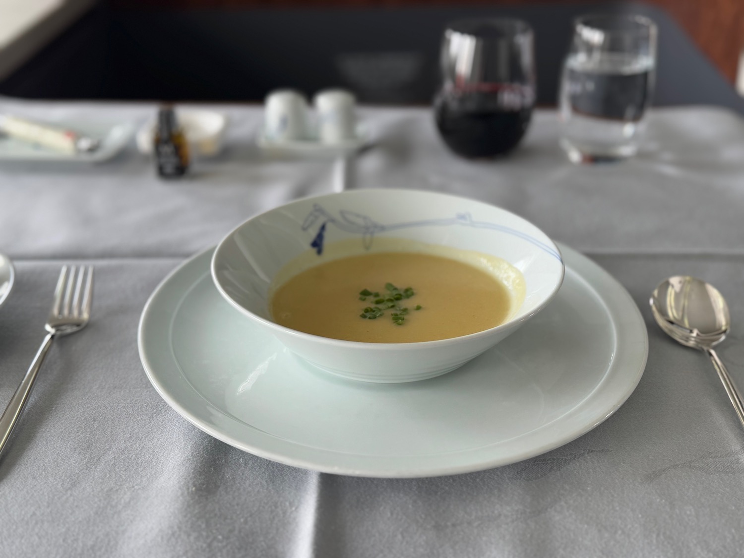 a bowl of soup on a plate