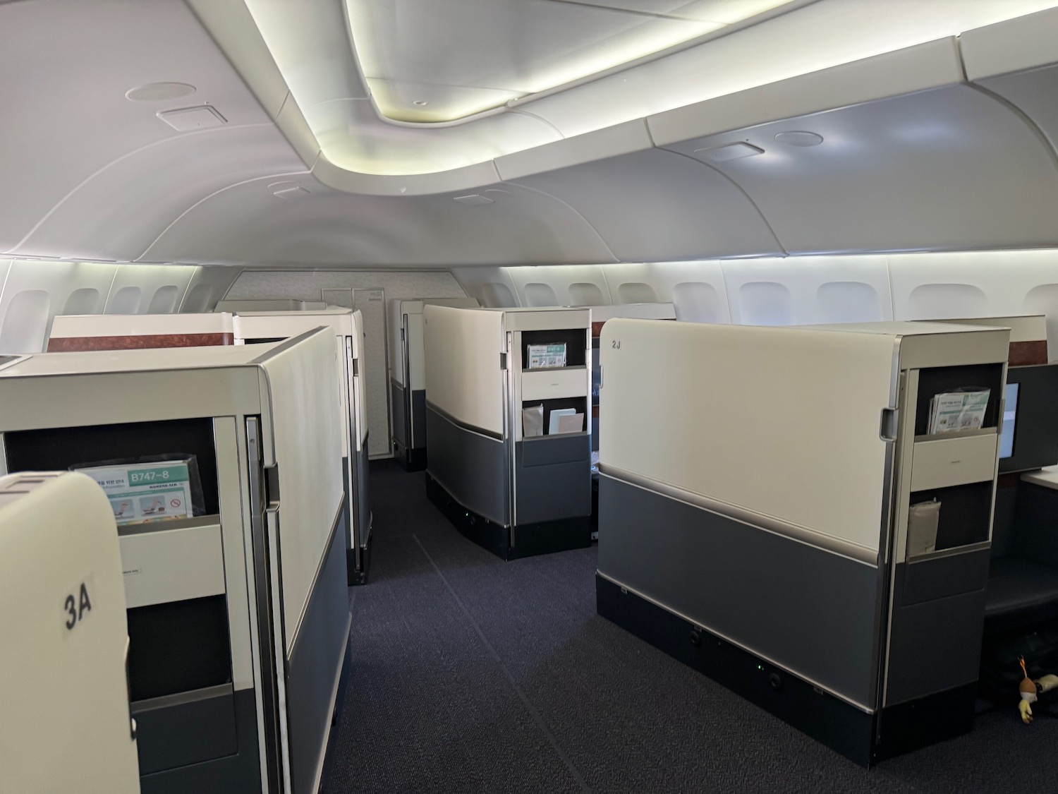 a room with cubicles in an airplane