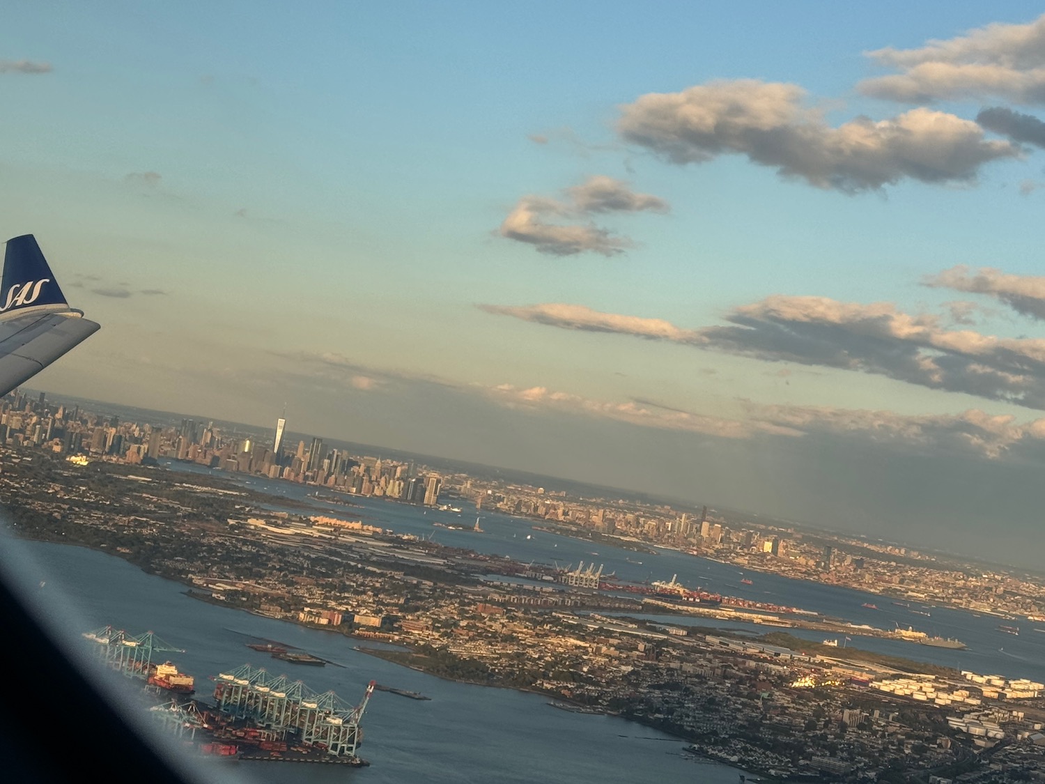 a city with a body of water and a bridge