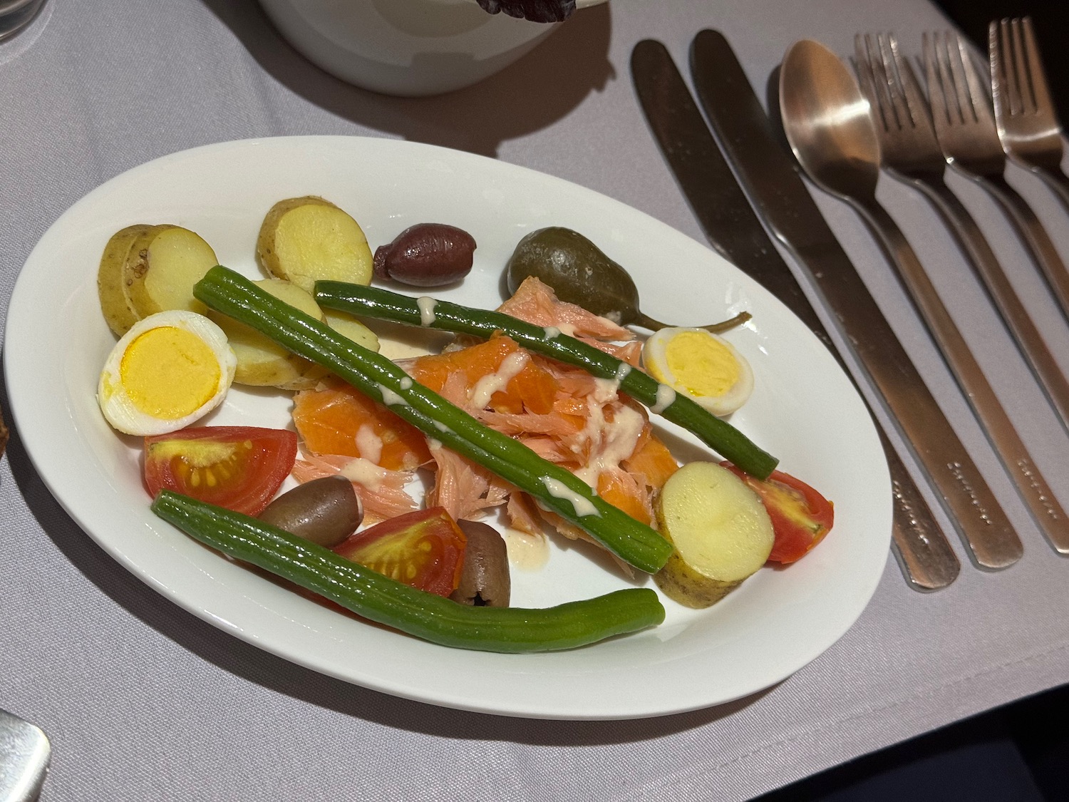 a plate of food with fork and knife