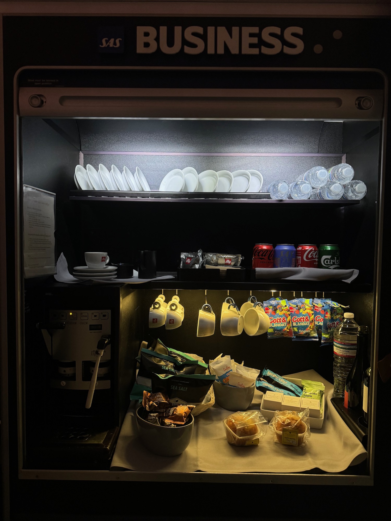 a refrigerator with plates and cups