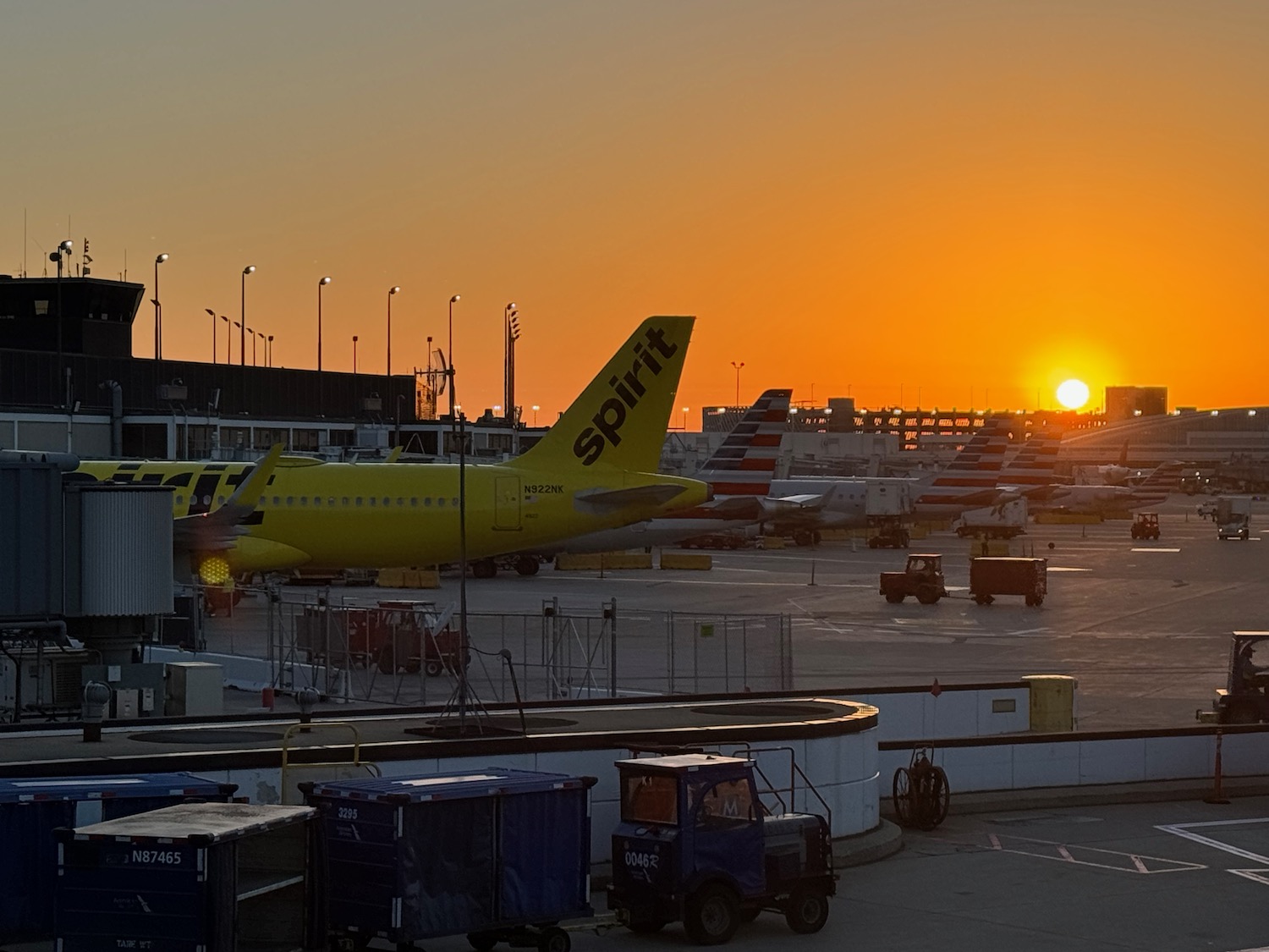 a group of airplanes at an airport