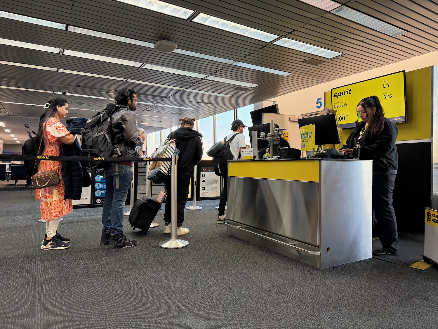 people standing in front of a counter