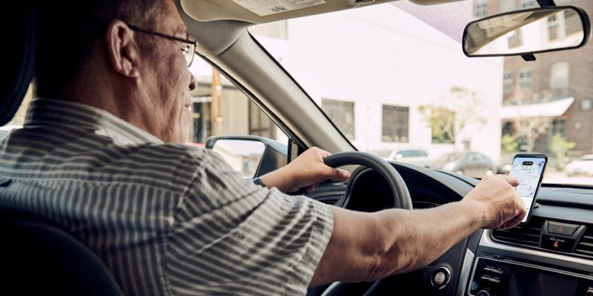 a man driving a car