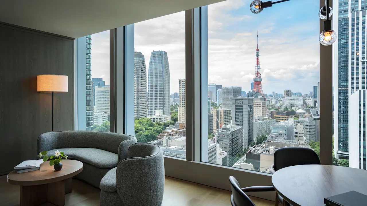 a room with a large window overlooking a city