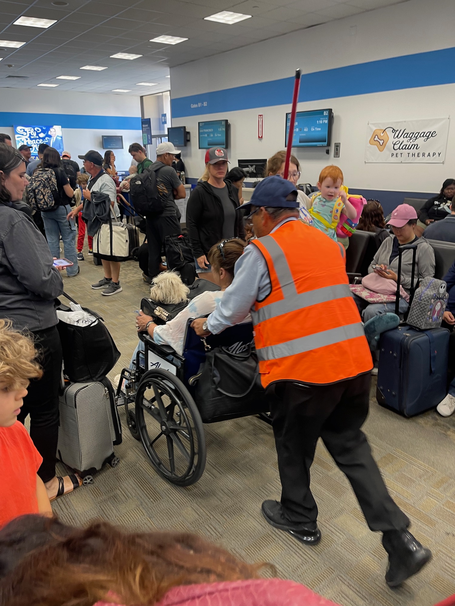 a group of people in an airport