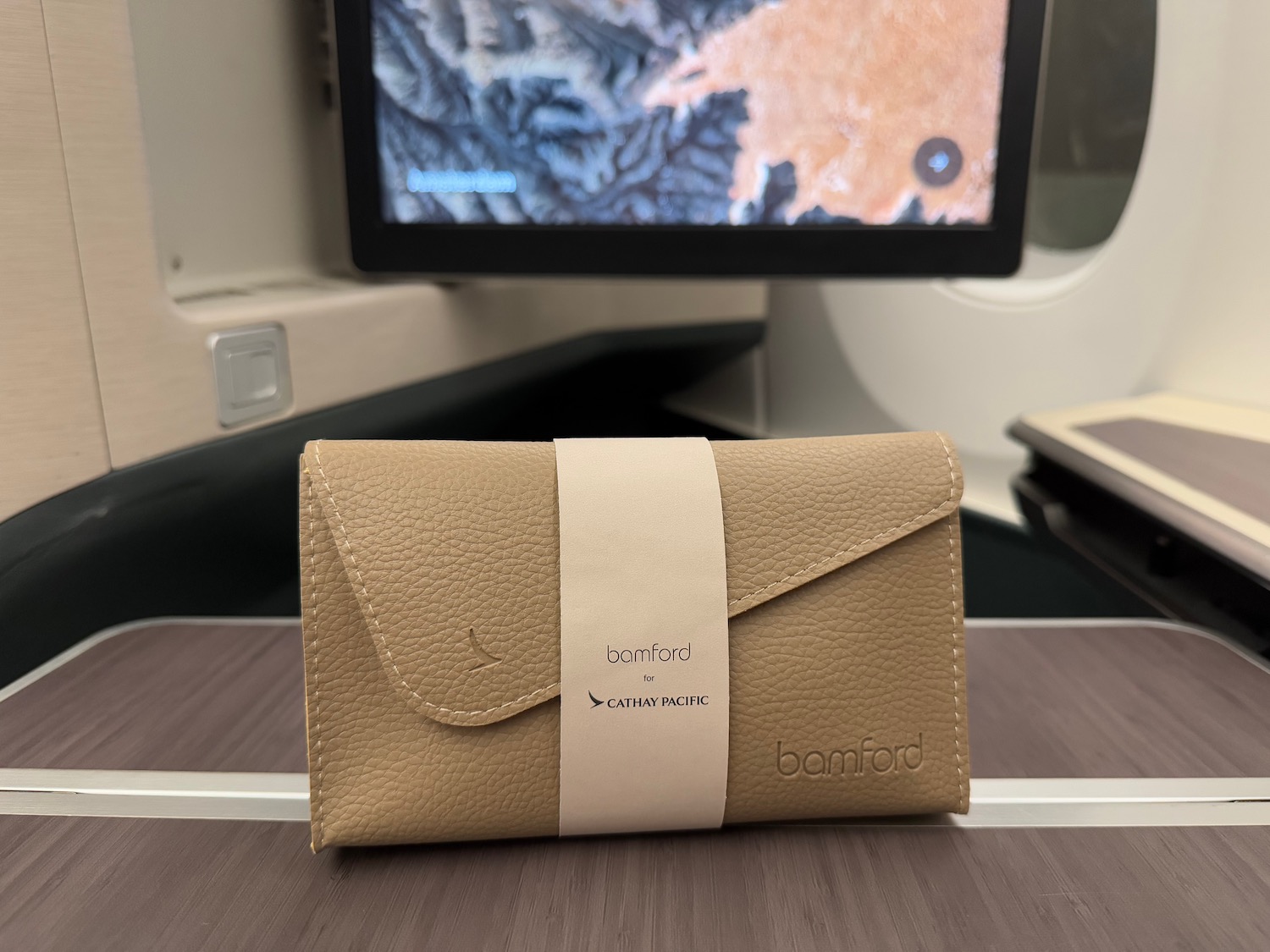 a brown leather wallet on a table