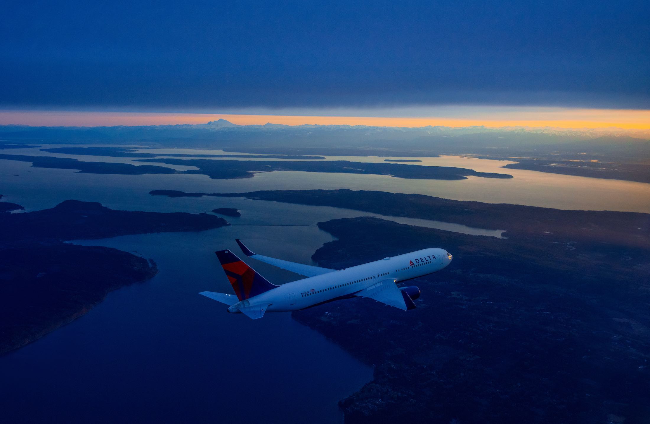 an airplane flying over water