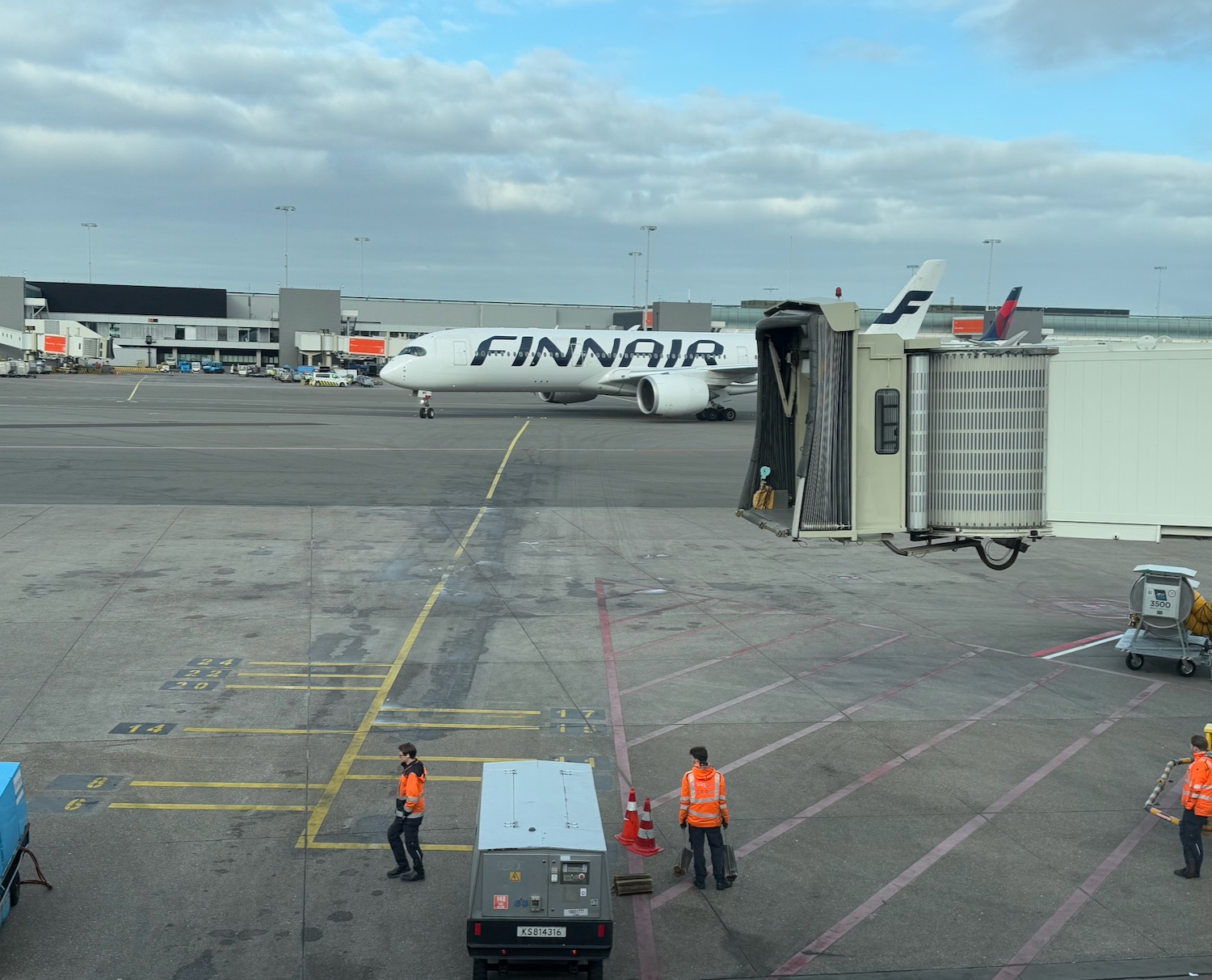 a group of people standing next to an airplane