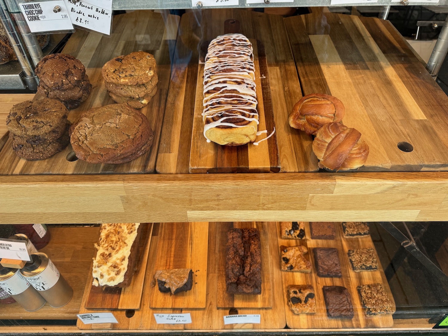 a display case with pastries and pastries