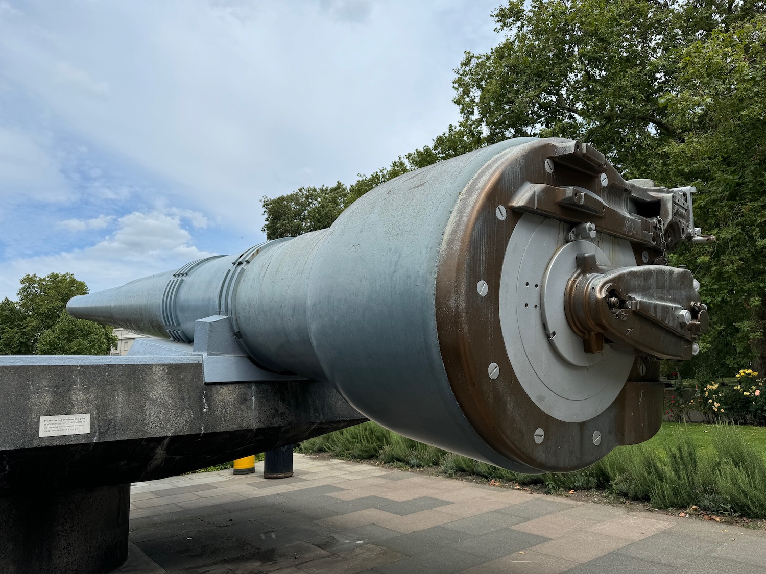 a large metal object on a stone platform