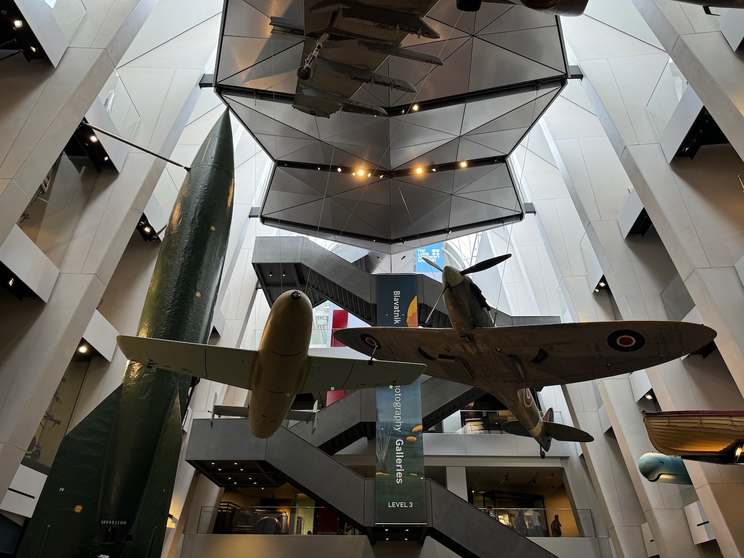 a group of airplanes from a ceiling