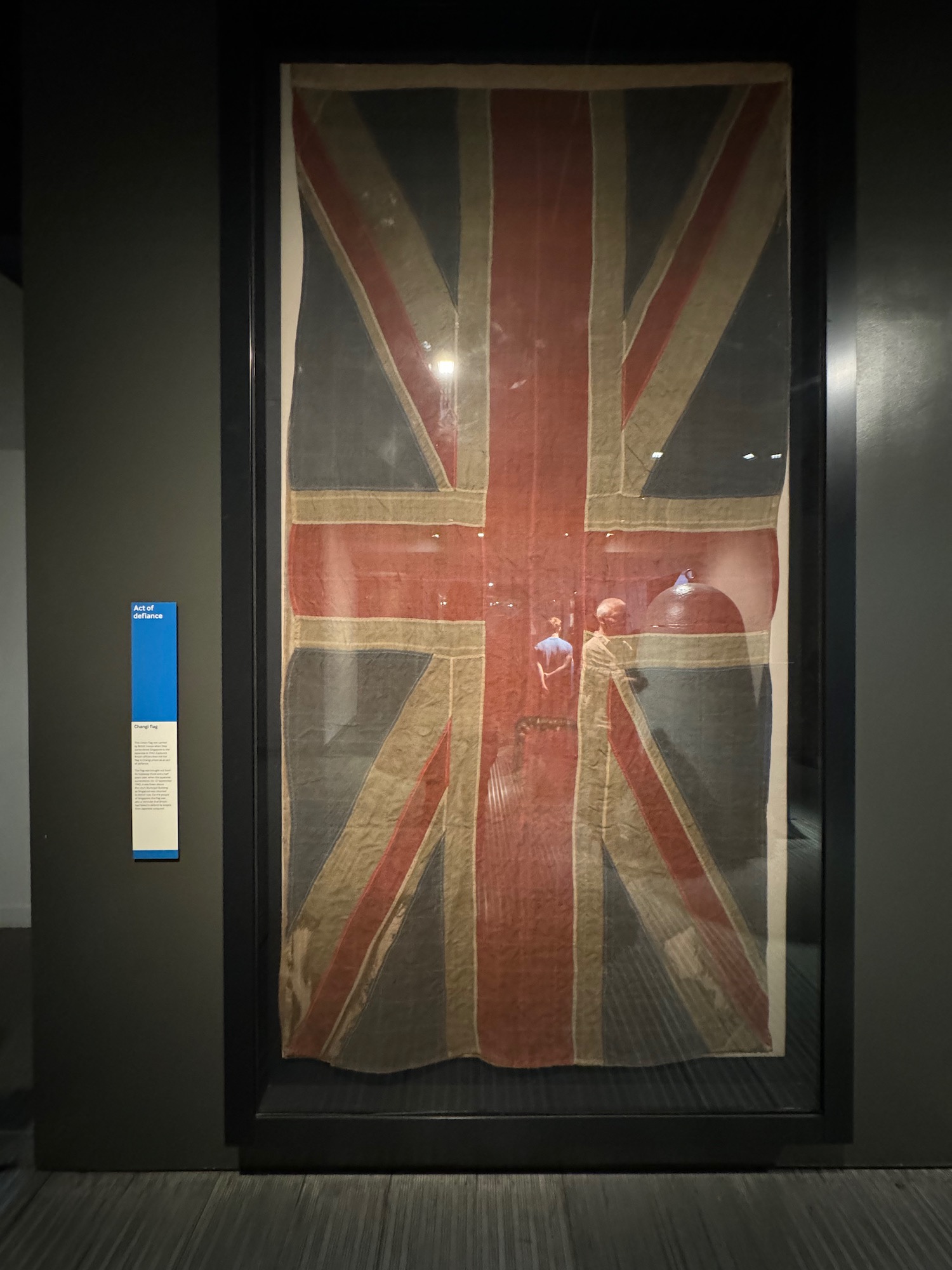 a flag in a glass case