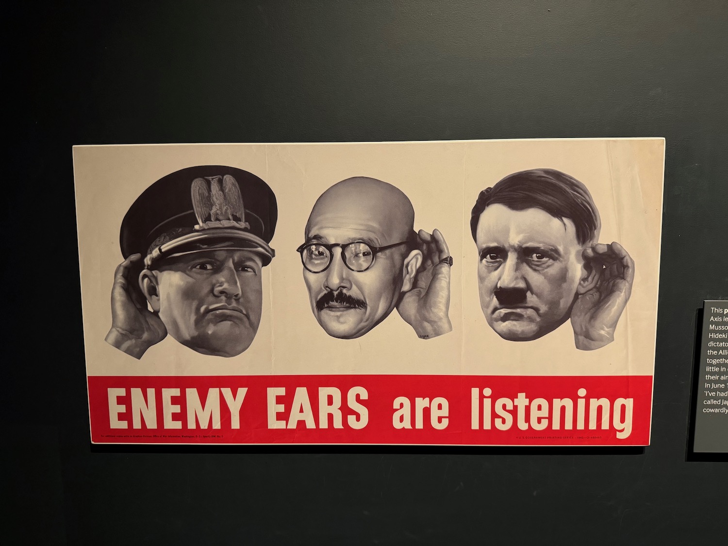 a poster with a group of men's faces