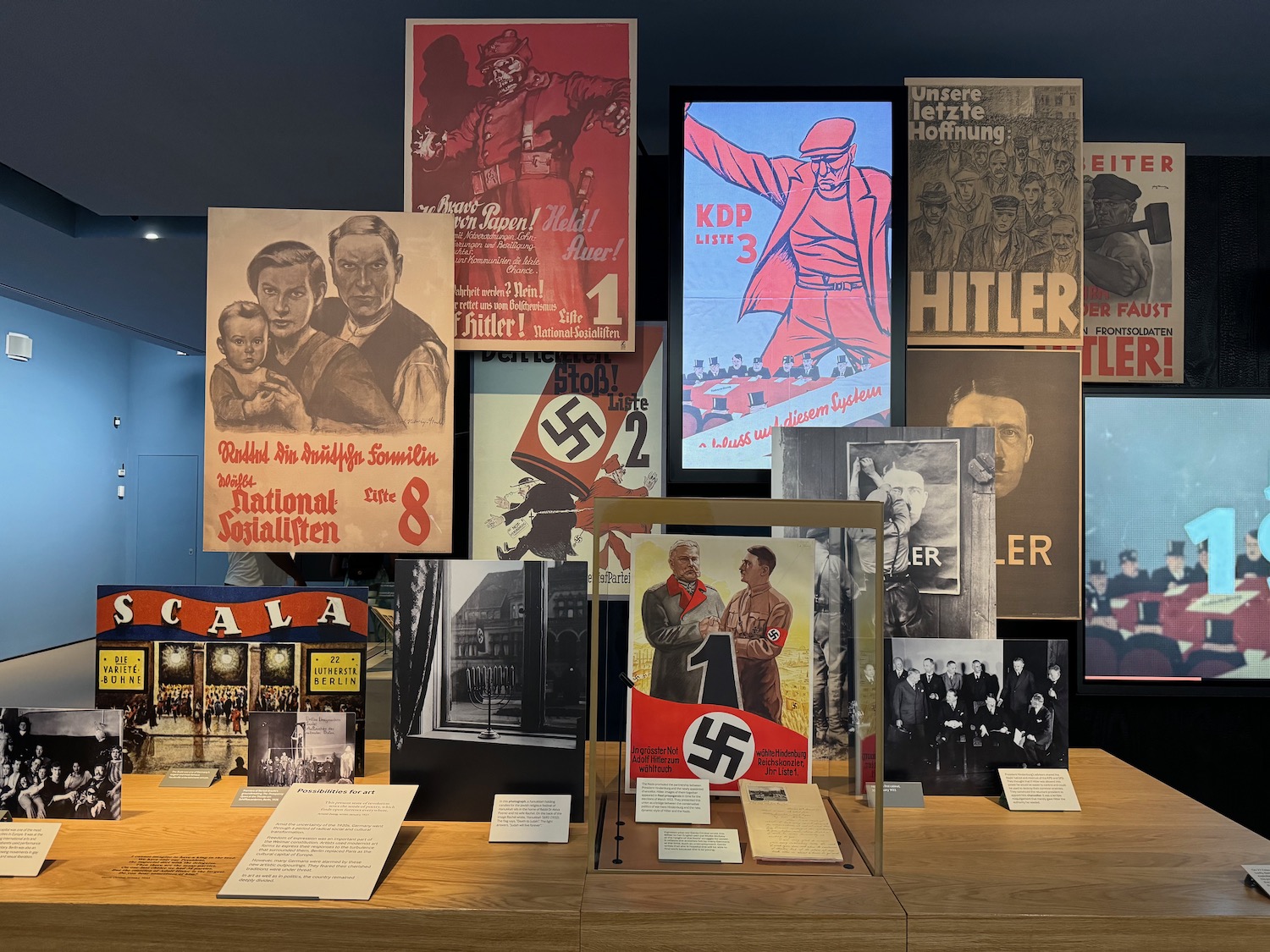 a display of posters on a table