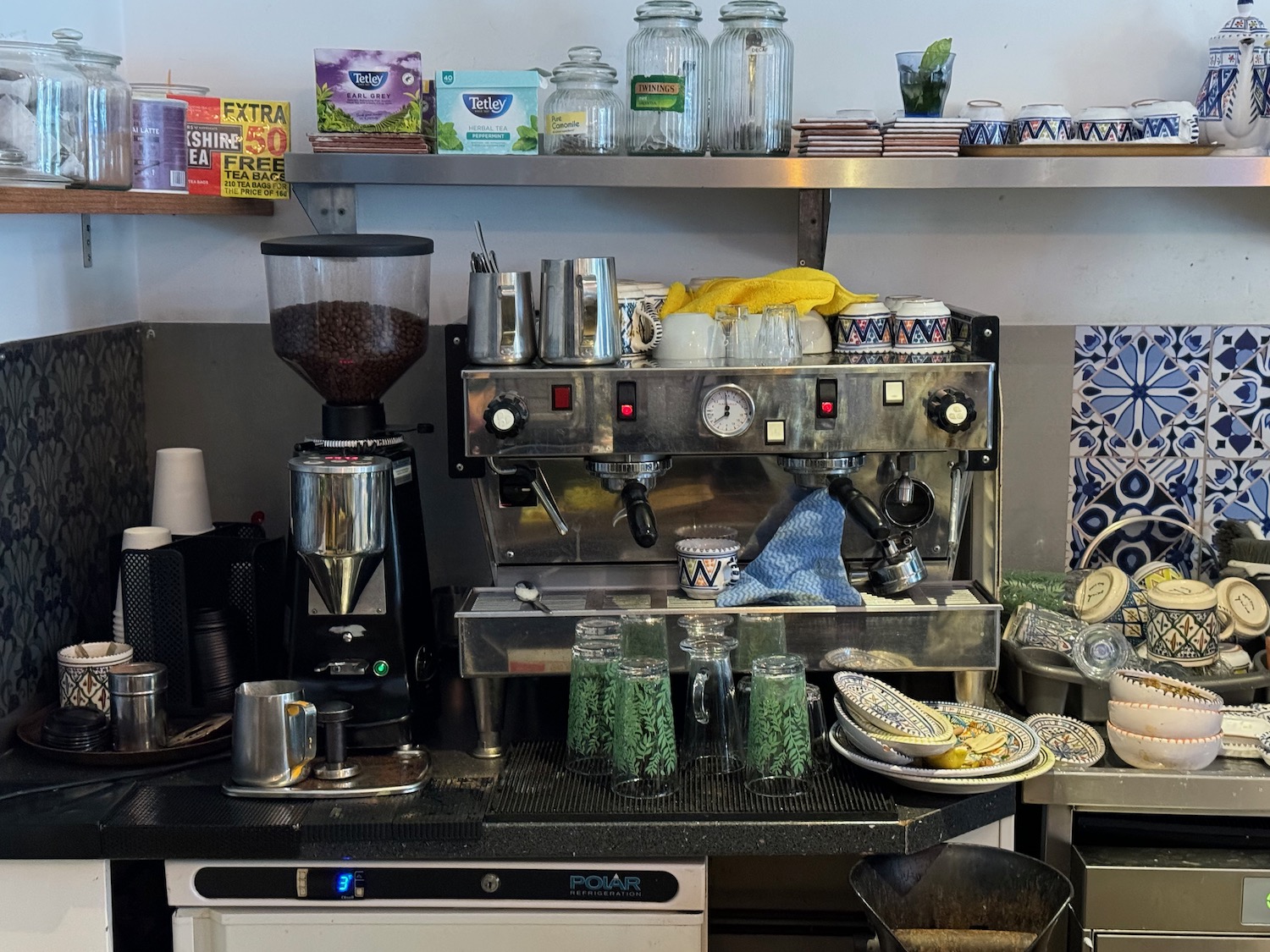 a coffee machine and other items on a counter