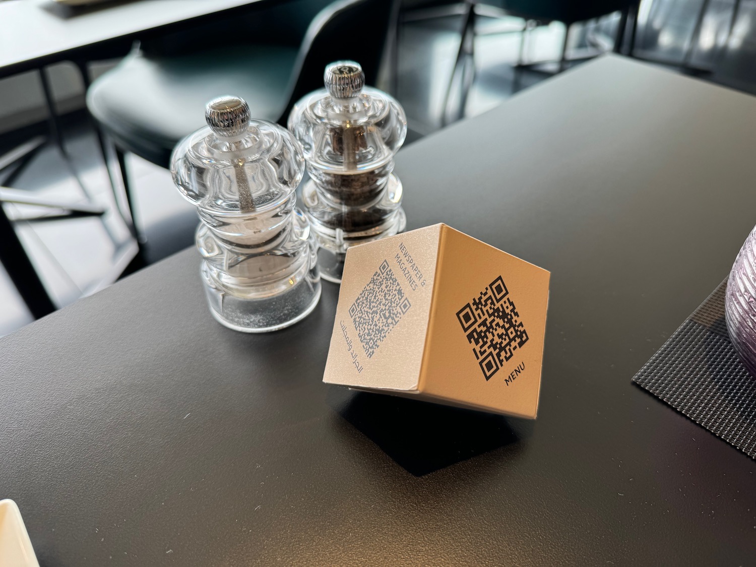 a salt and pepper shakers on a table