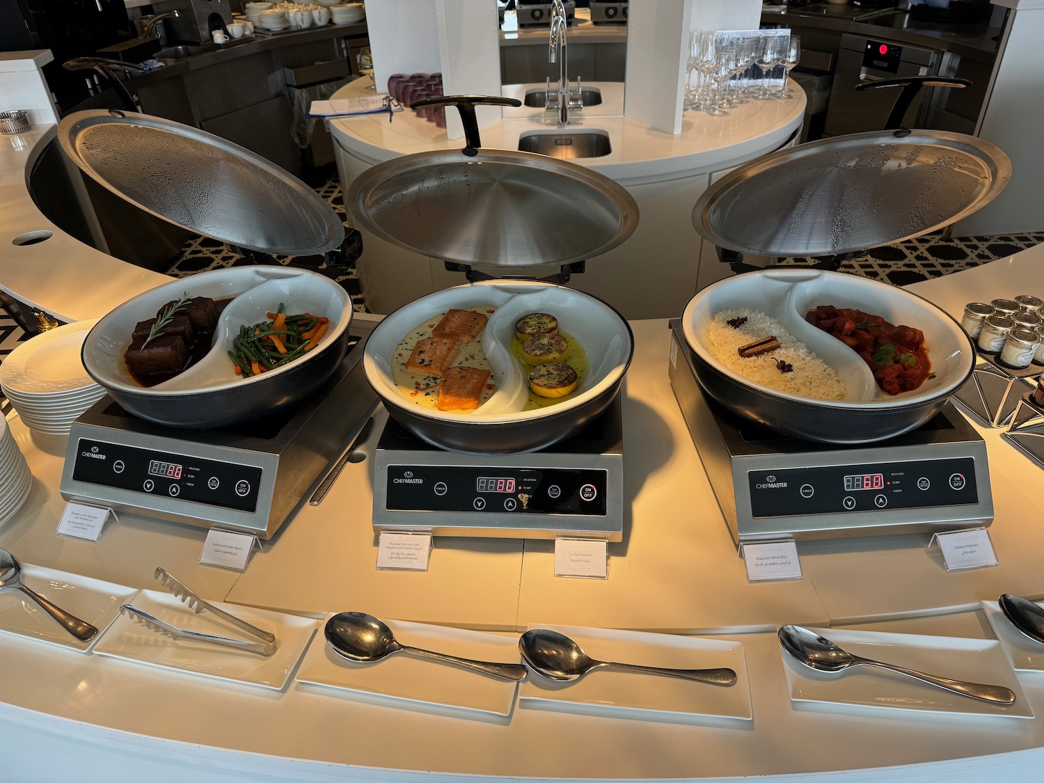 a group of bowls of food on a counter