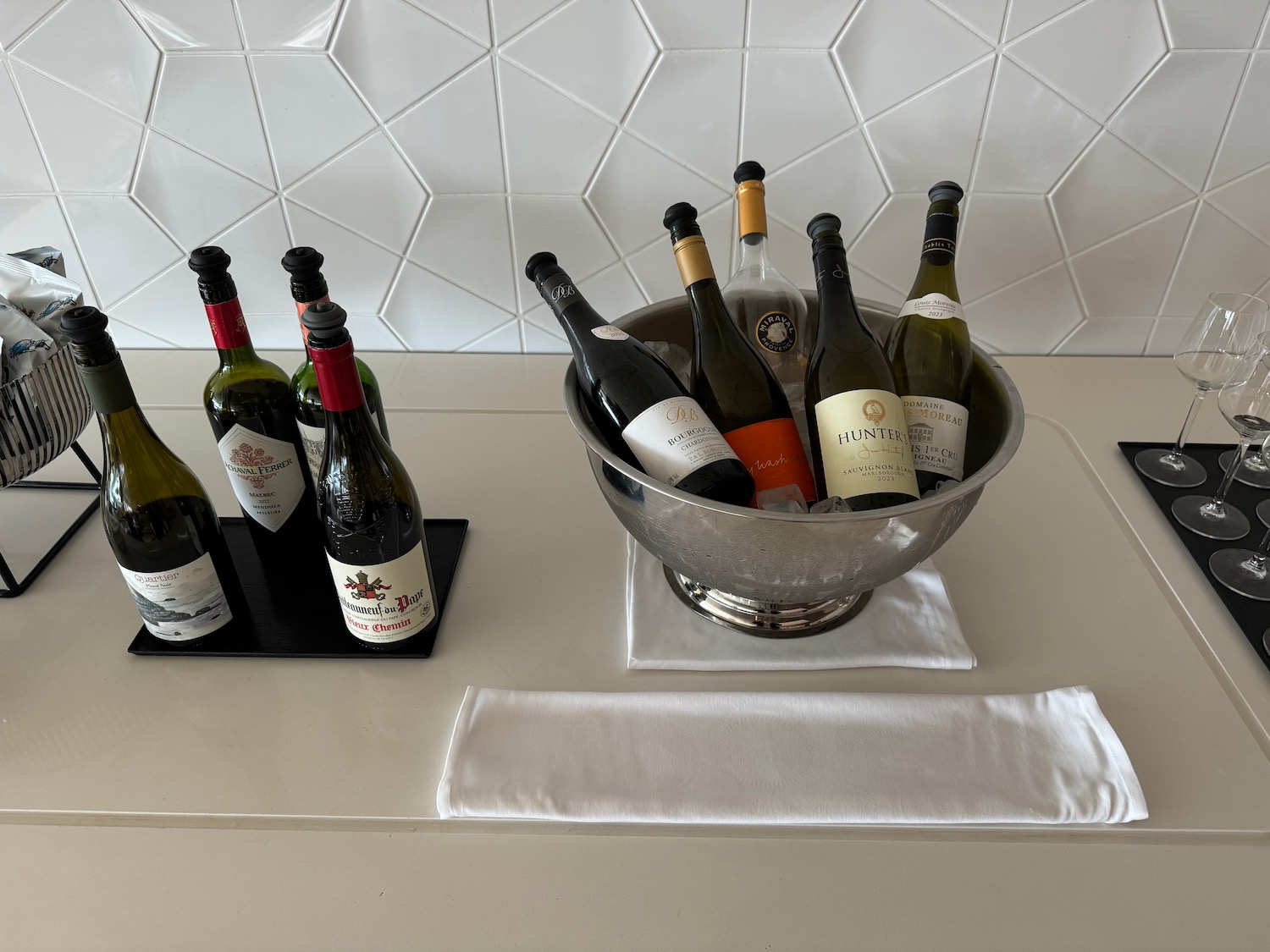 a group of bottles in a bowl