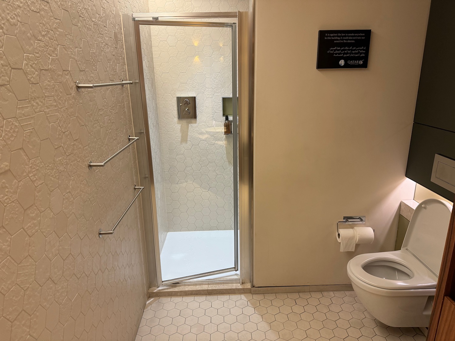 a bathroom with a glass door