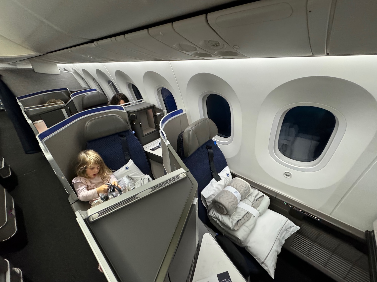 a child sitting in a plane