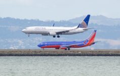 a group of airplanes on a runway