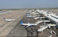 an airport with airplanes parked on the ground