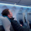 a man sitting in an airplane