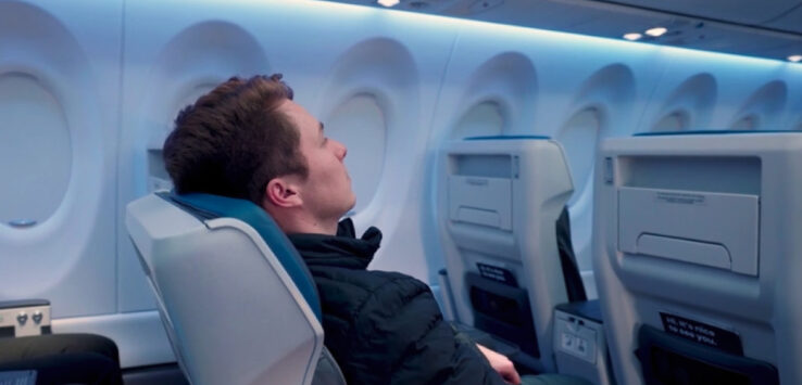 a man sitting in an airplane