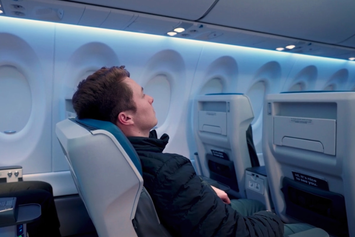 a man sitting in an airplane