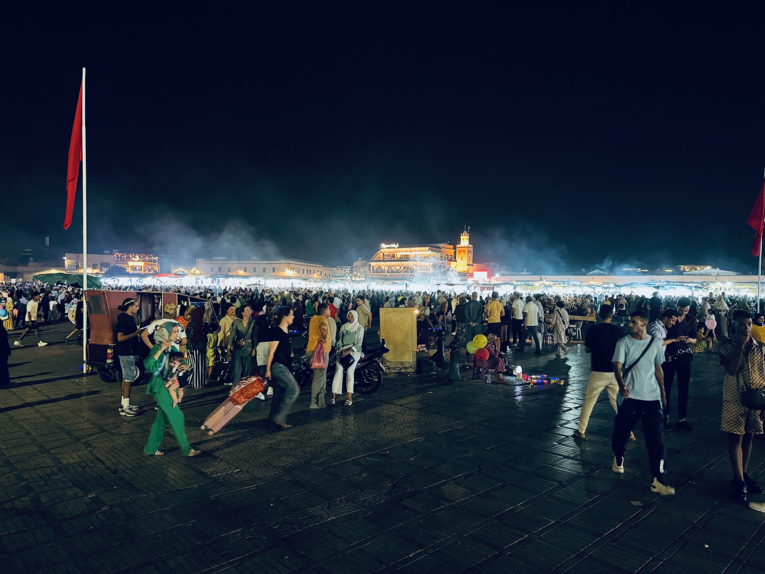 a crowd of people in a square