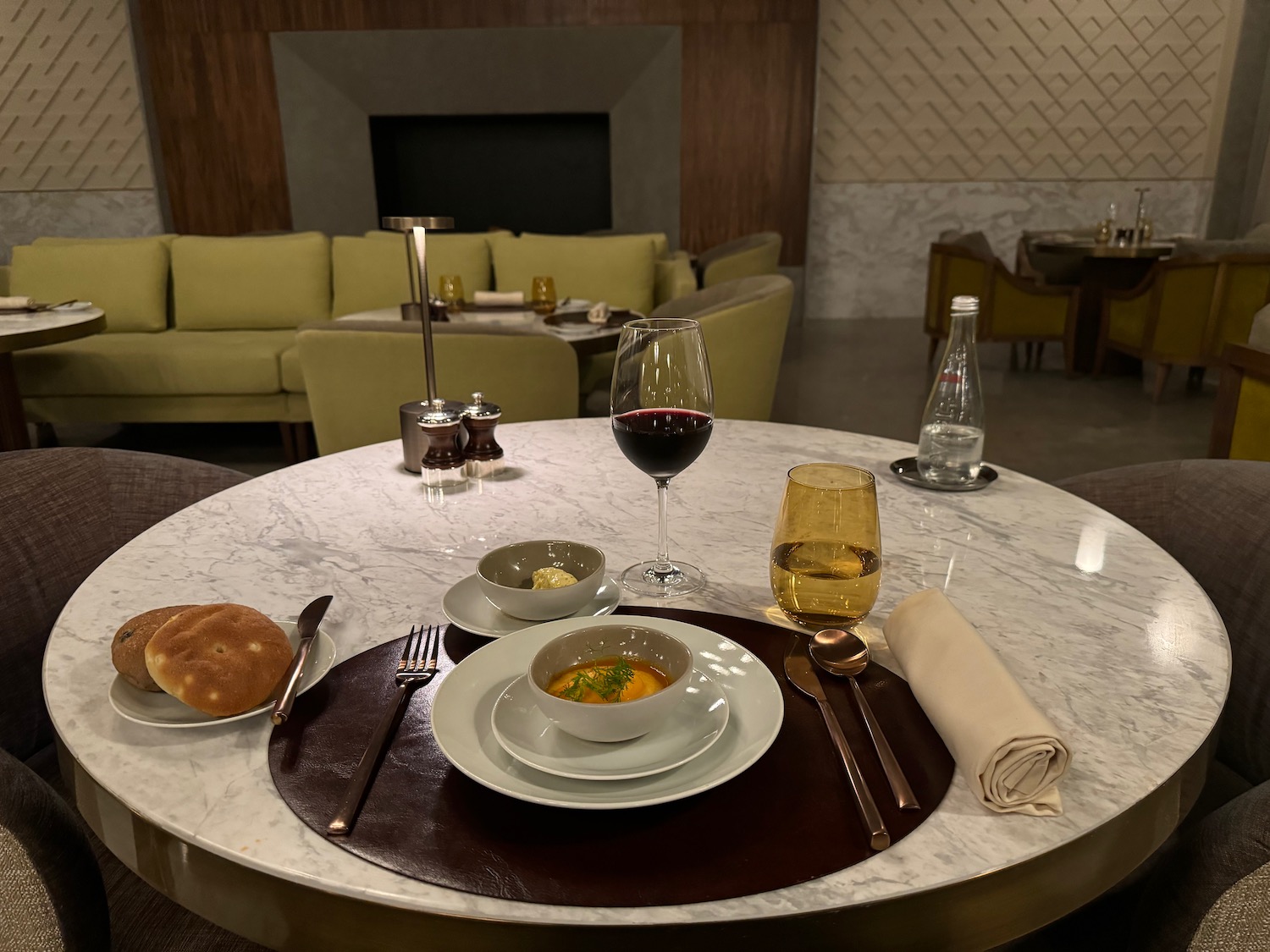 a table with food and wine on it