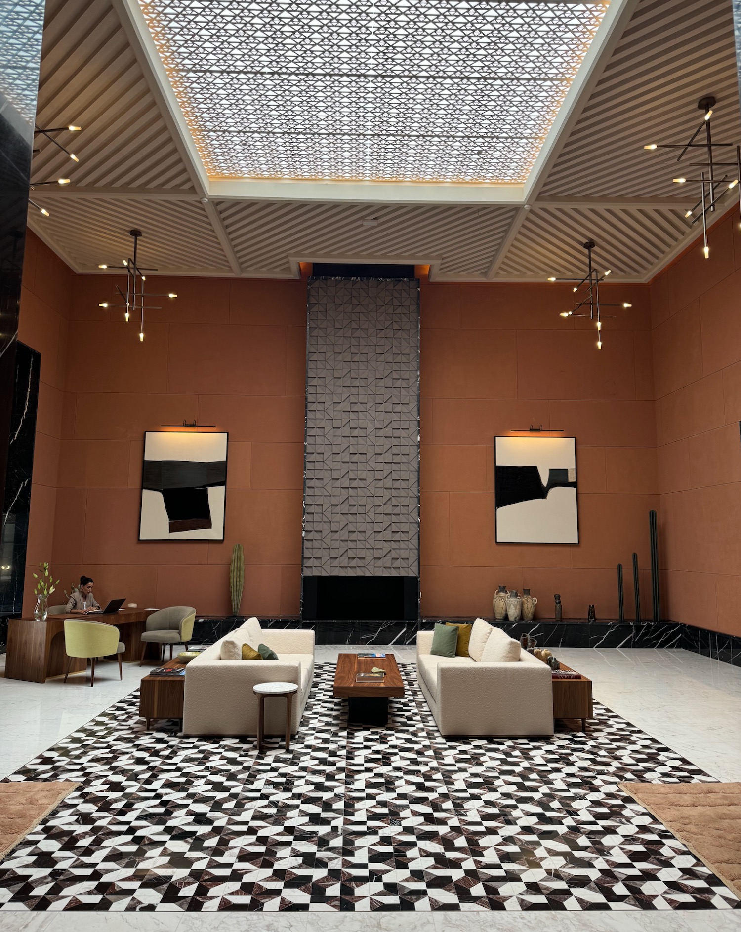 a room with a large wall and a large ceiling