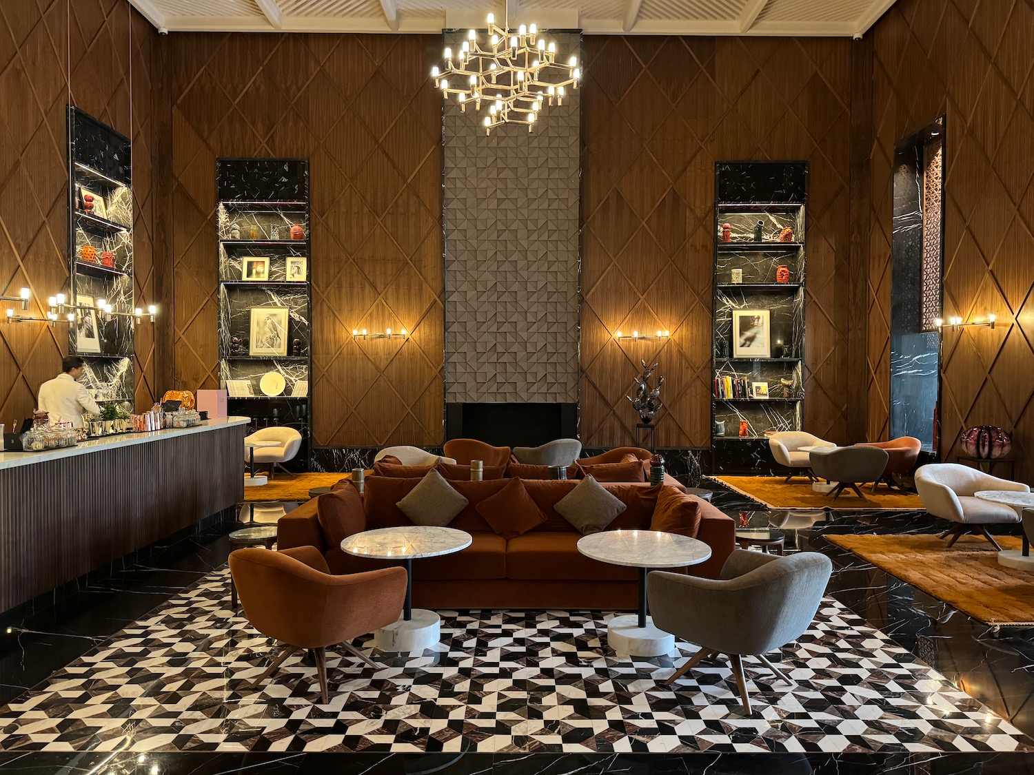 a room with a black and white floor and a black and white patterned floor
