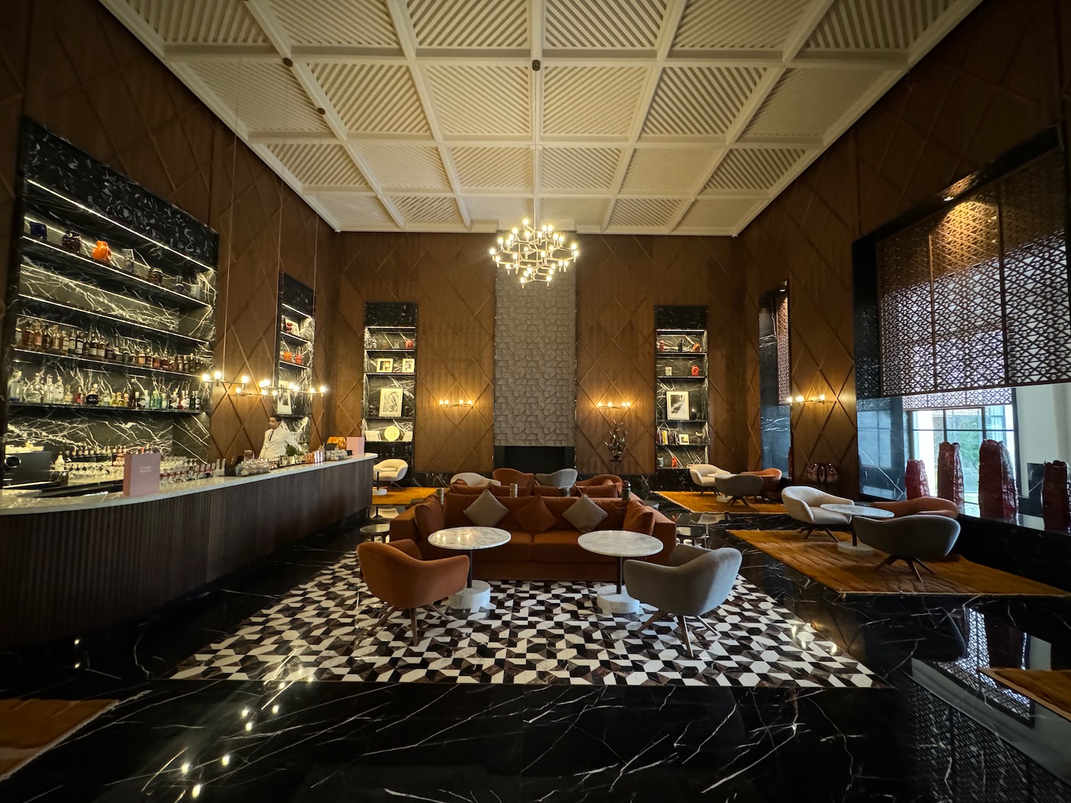 a room with a bar and a couch
