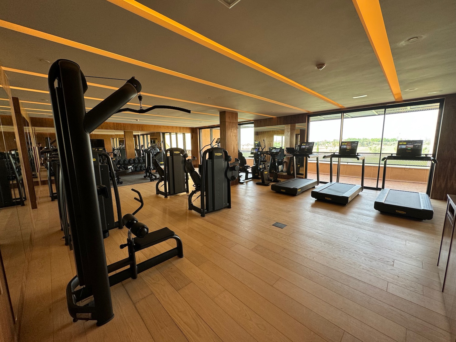 a large room with exercise equipment