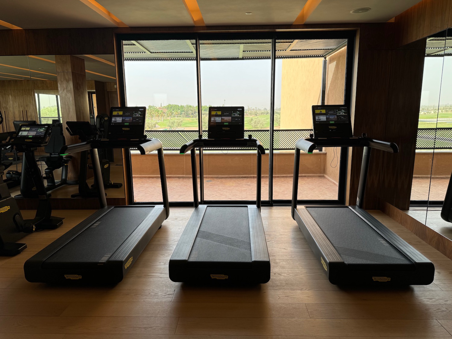 tread treadmills in a room with a window