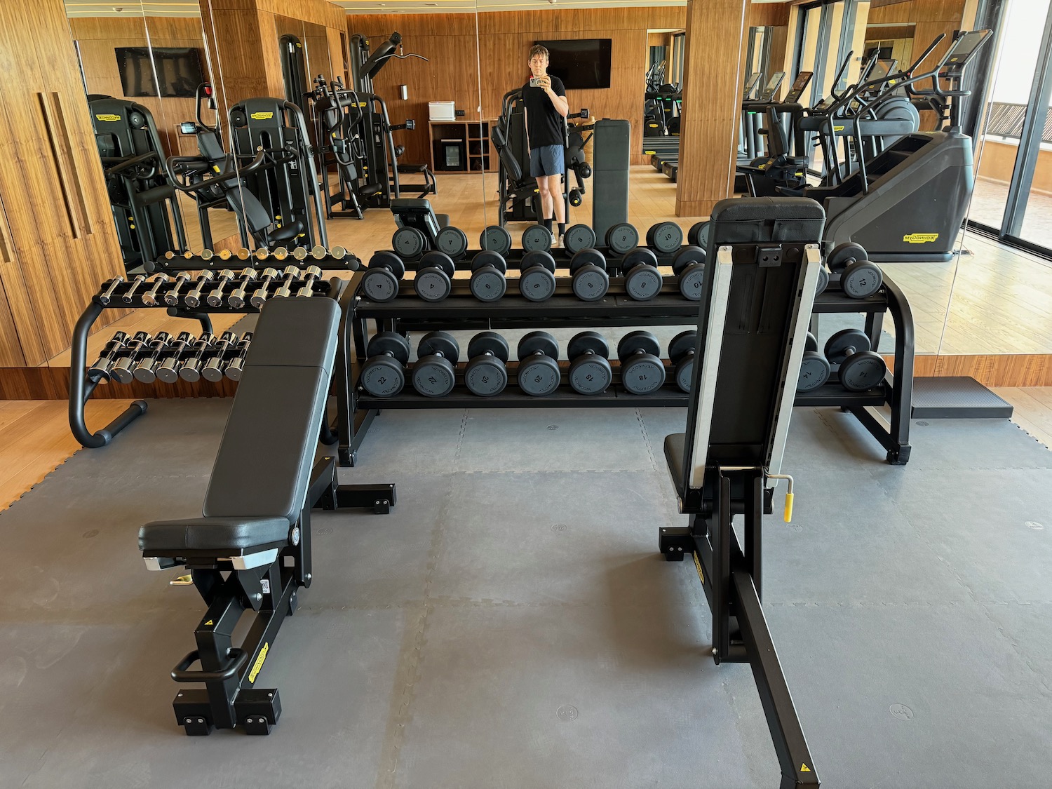 a man standing in a gym
