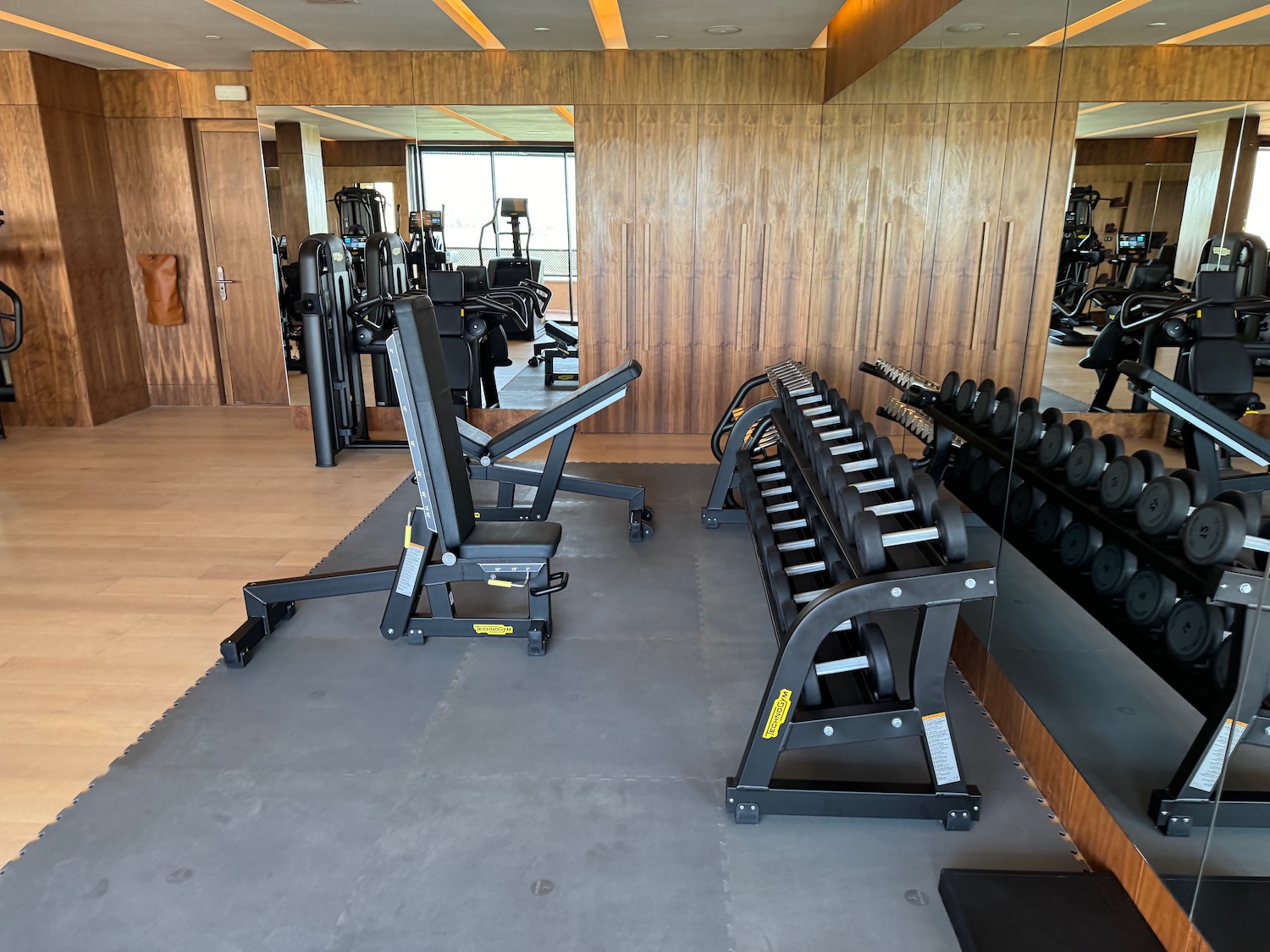 a room with weights and exercise equipment