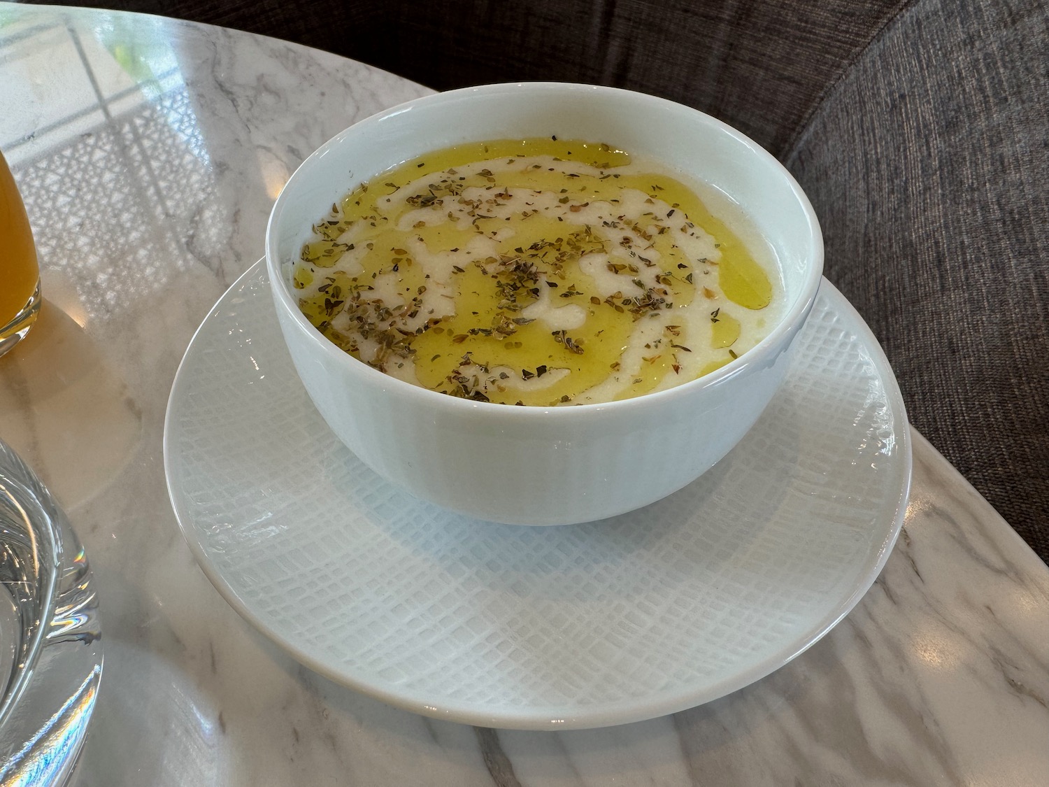 a bowl of soup on a plate