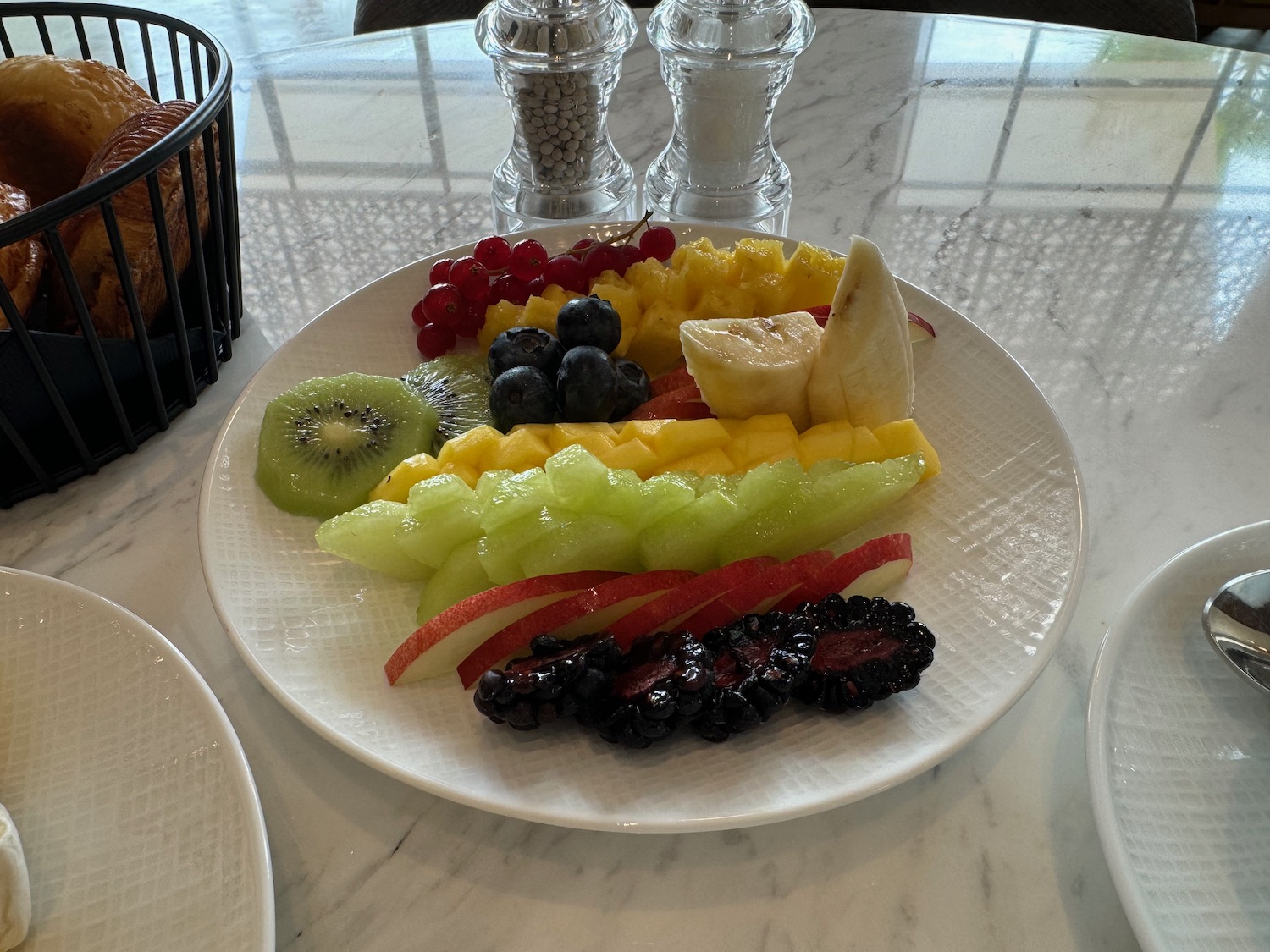 a plate of fruit on a table