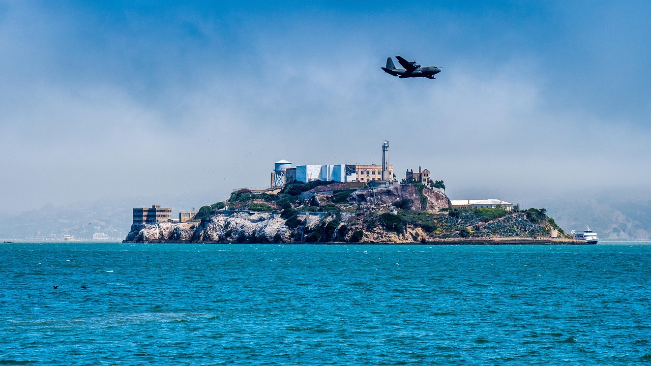 an airplane flying over an island