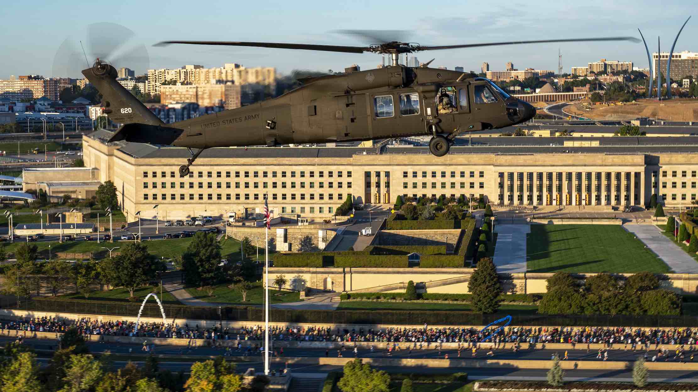 a helicopter flying over a building