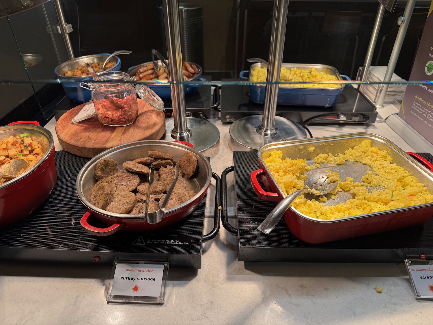 a group of pans with food in them