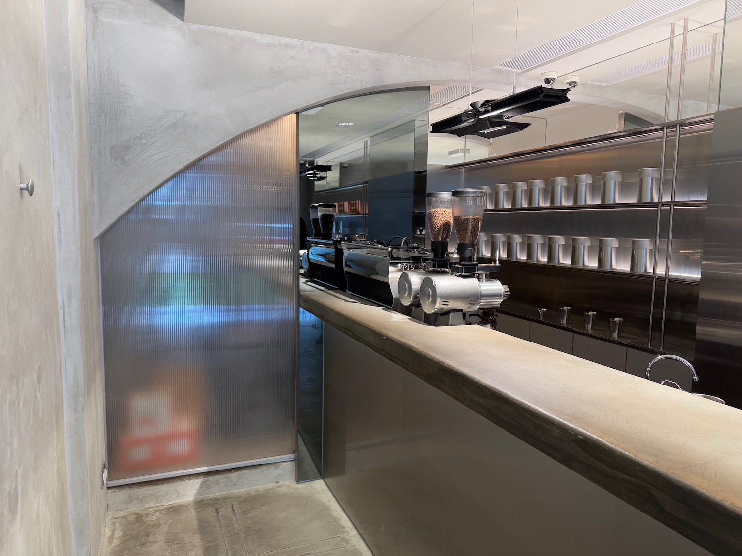 a counter with coffee machines in a restaurant