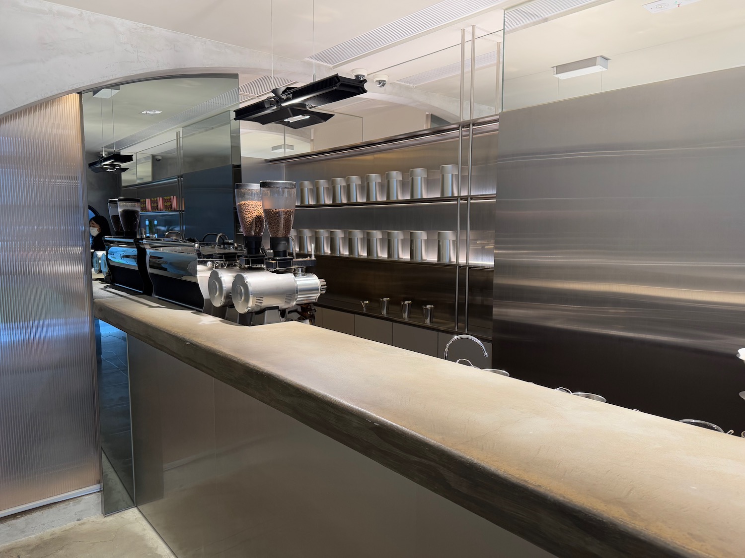 a counter with coffee machines in a restaurant